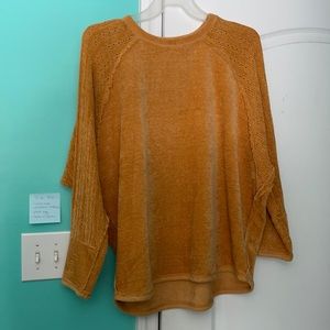 Size M yellow sweater in great condition!
